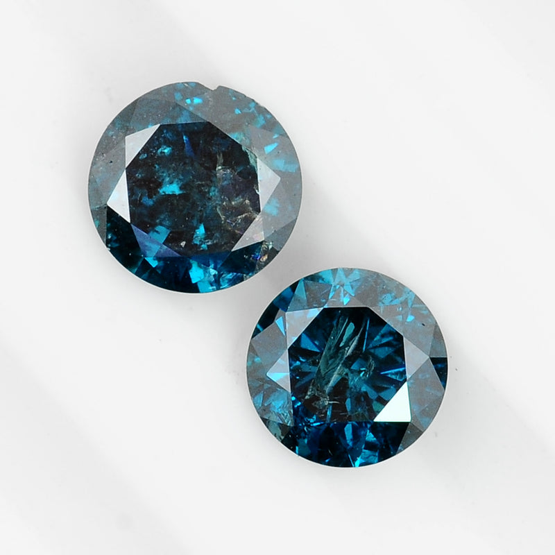 2 pcs Diamond  - 0.83 ct - ROUND - Fancy Deep Blue/Greenish Blue - I2/I3