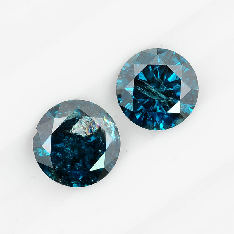 2 pcs Diamond  - 0.83 ct - ROUND - Fancy Deep Blue/Greenish Blue - I2/I3