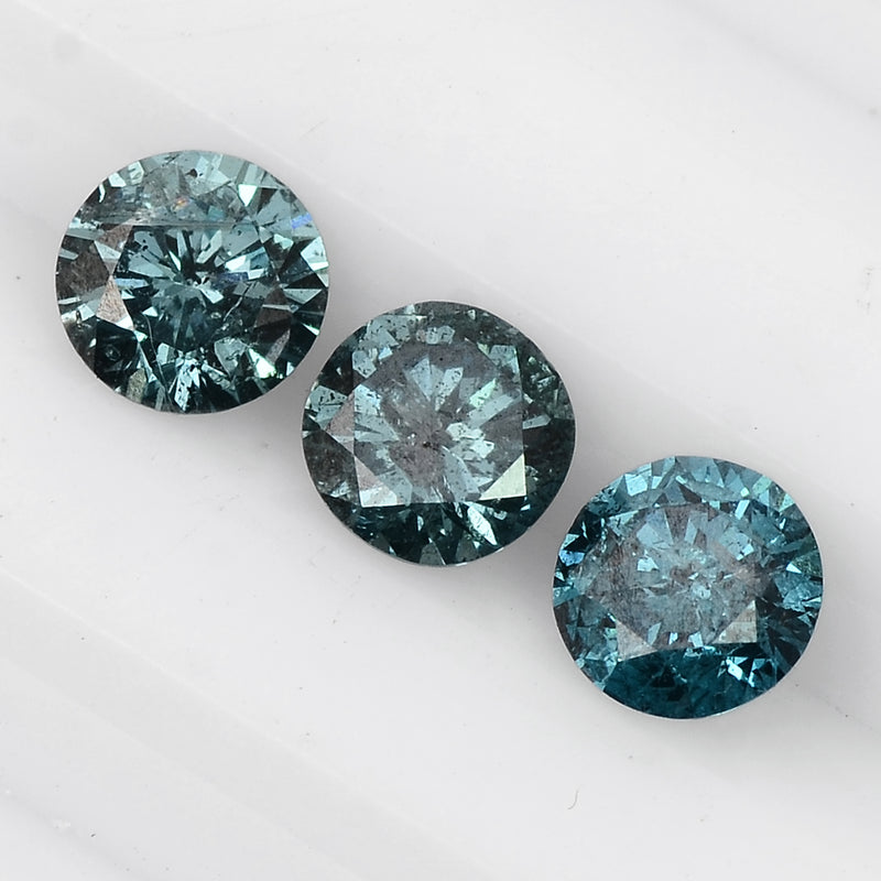 3 pcs Diamond  - 0.77 ct - ROUND - Fancy Vivid Blue/Greenish Blue - I2
