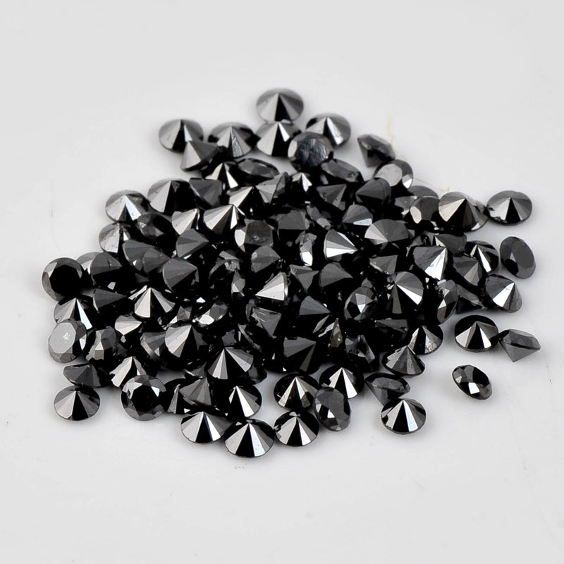 7.02 Carat Brilliant Round Fancy Black Diamonds-AIG Certified