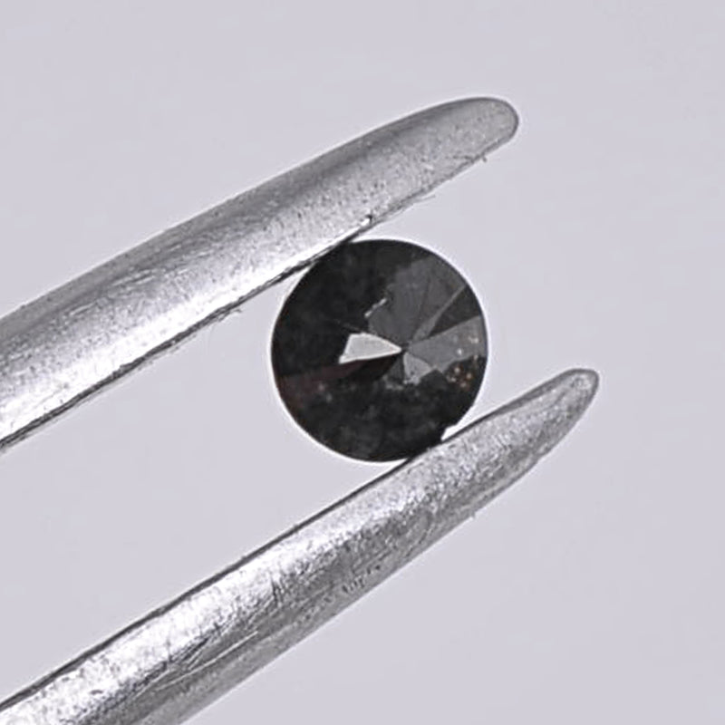 7.03 Carat Brilliant Round Fancy Black Diamonds-AIG Certified