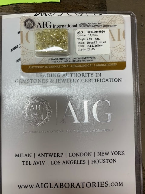 Round Natural Fancy Light Yellow Color Diamond 4.69 Carat - AIG Certified